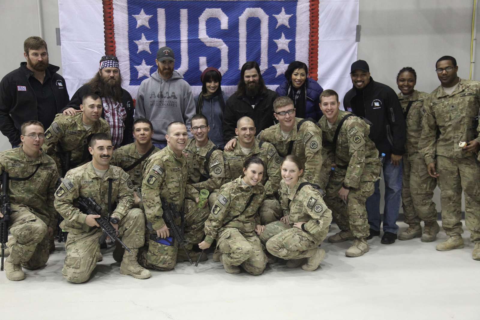 USO tour celebrities pose for group photos at the end NARA & DVIDS