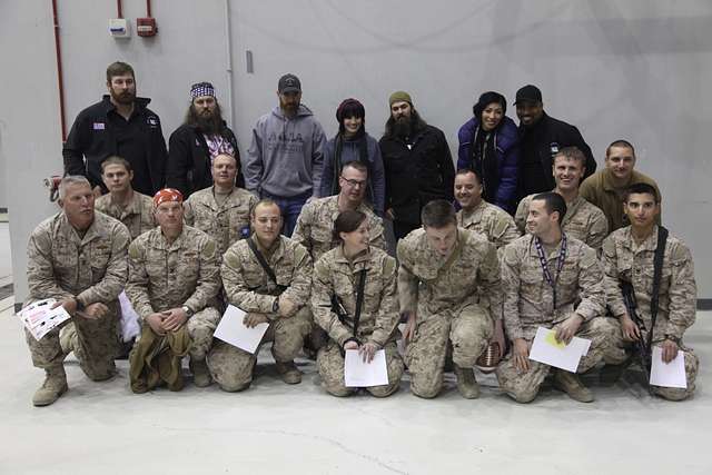 USO tour celebrities pose for group photos at the end - NARA & DVIDS