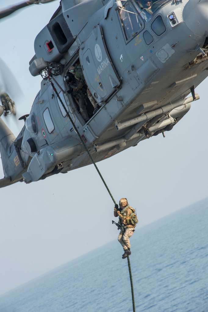 Italian marines fast rope from an Italian EH-101 Merlin - PICRYL Public ...