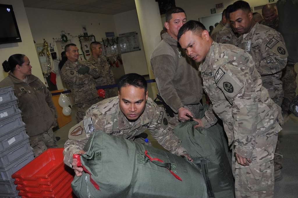 Staff Sgt. Rodney Retuyan, left, and Spc. Frank Rosalin - NARA & DVIDS ...