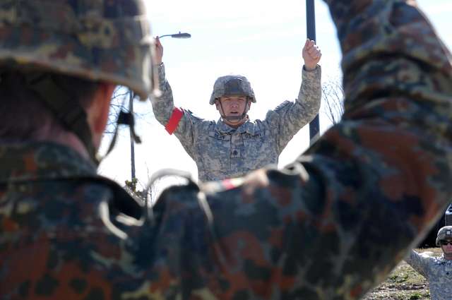 DVIDS - Images - German Paratrooper Hooks Up His Static Line [Image 2 of 8]