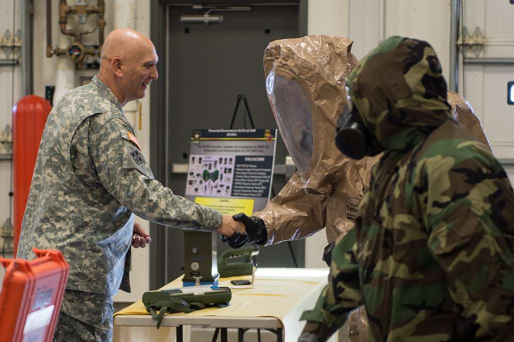 Army Chief of Staff Gen. Ray Odierno stands next to the umpire