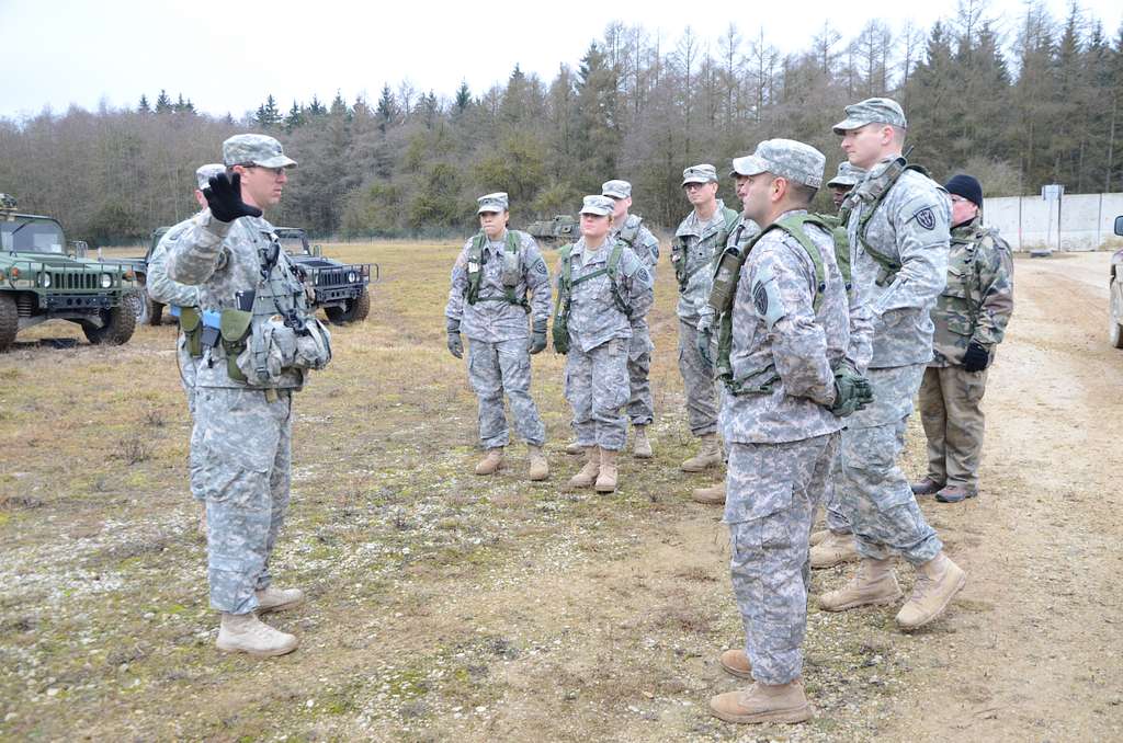 U.S. Army Capt. Benjamin Roark, left, an observer/coach - PICRYL Public ...