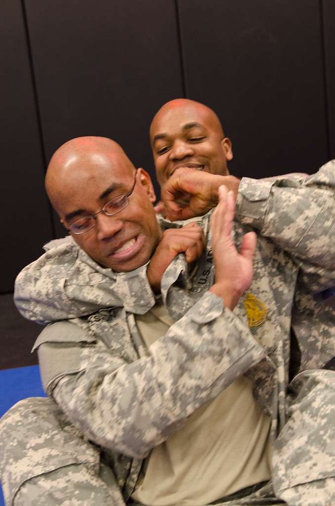 Sgt. 1st Class Ramon Jackson tries to resist being - PICRYL - Public Domain  Media Search Engine Public Domain Search