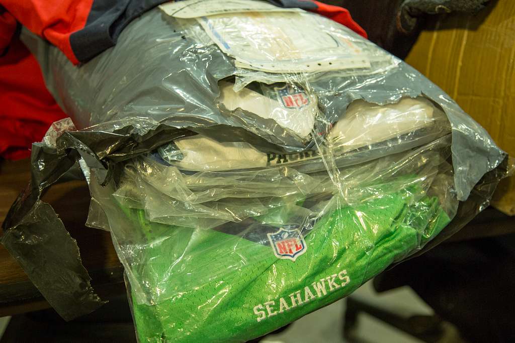 File:Counterfeit NFL Jerseys seized by CBP at JFK International Mail  Facility (12220686175).jpg - Wikimedia Commons