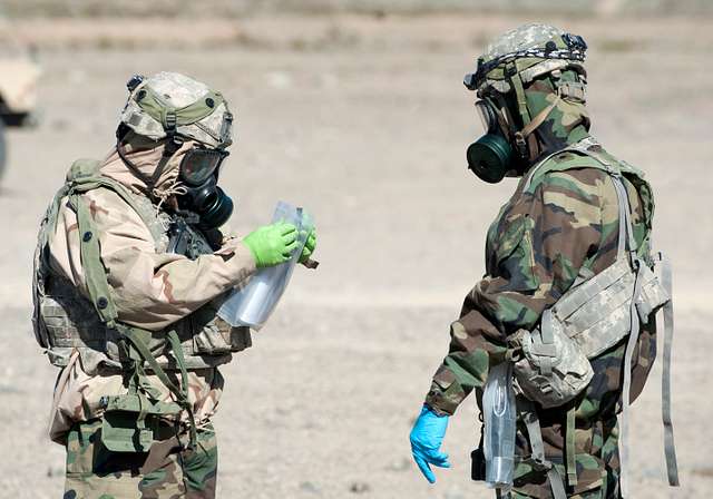 A CBRNE Response Team member takes and securely packages - NARA & DVIDS ...