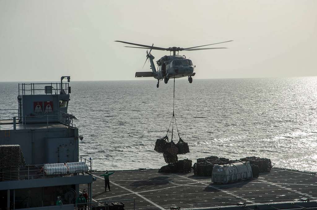 A U.S. Navy MH-60S Seahawk helicopter assigned to Helicopter - NARA ...