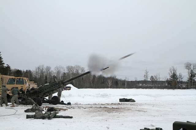 A 155mm artillery round is fired from an M-777 howitzer - NARA & DVIDS ...