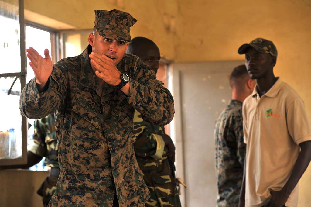 U.S. Marine Corps Sgt. Ibrahim Bosch gives feedback PICRYL