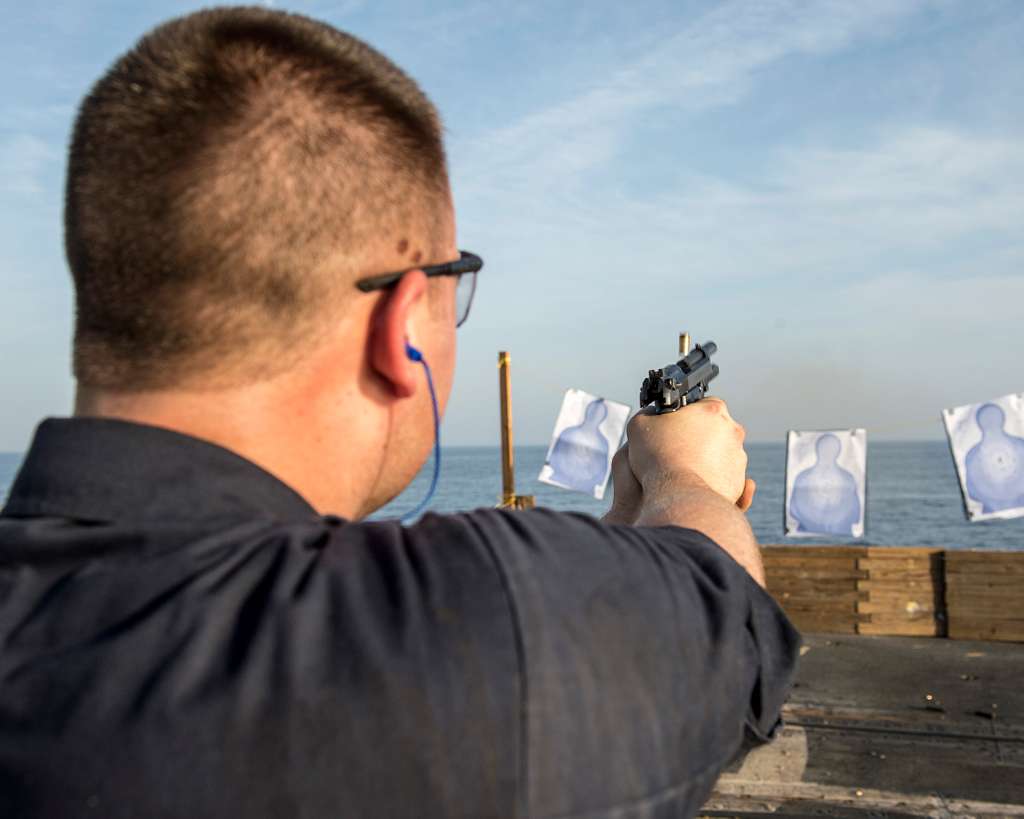 U.S. Navy Quartermaster Seaman Joe Percival fires an - PICRYL - Public ...