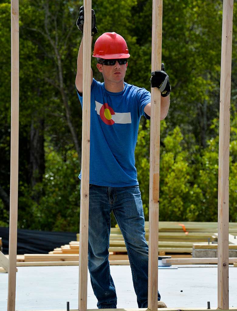 Volunteers from the 823rd RED HORSE Squadron help build - PICRYL ...