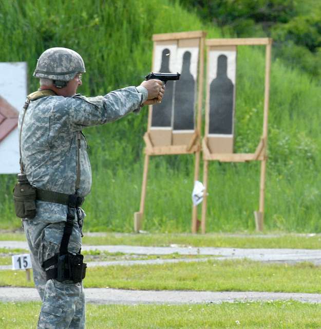 Army Spc. Stephen Drolet, a Soldier in the Massachusetts National Guard,  takes aim with a rifle during the 80-hour, Train-the-trainer Military  Funeral Honors course at Camp Smith Training Site May 11, 2017.