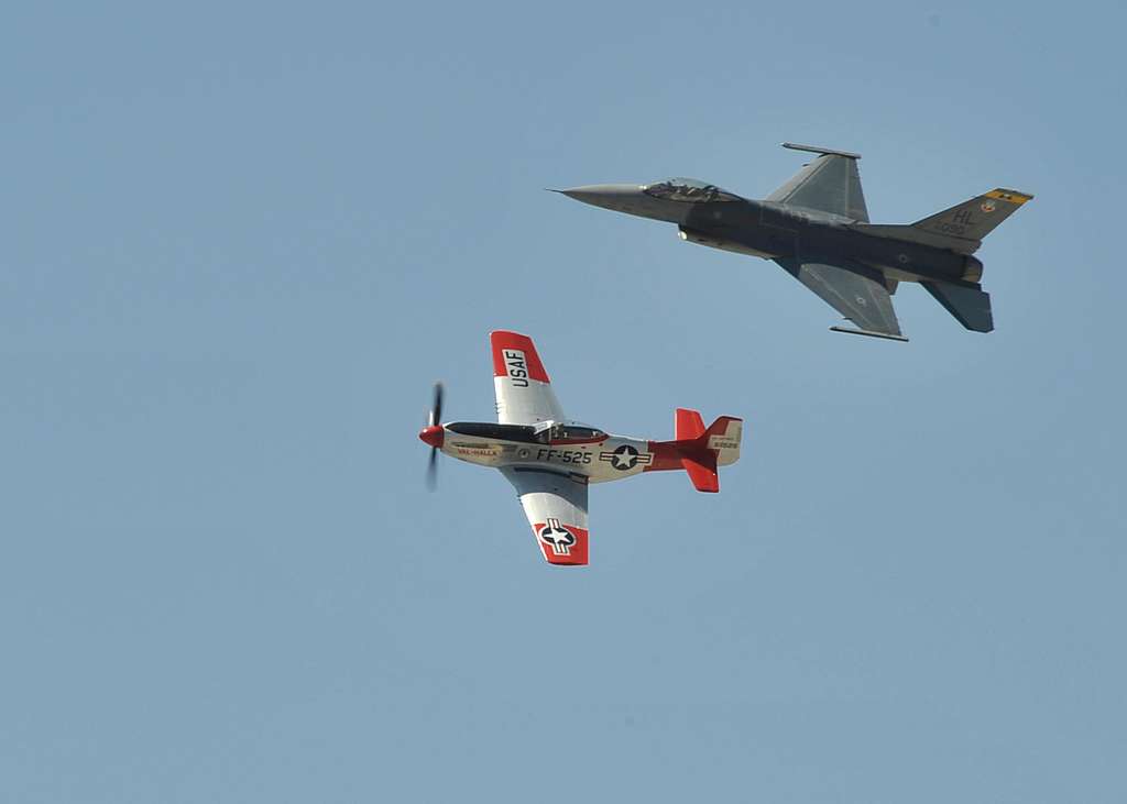 A P-51 Mustang Flies In Formation With An F-16 Fighting - NARA & DVIDS ...