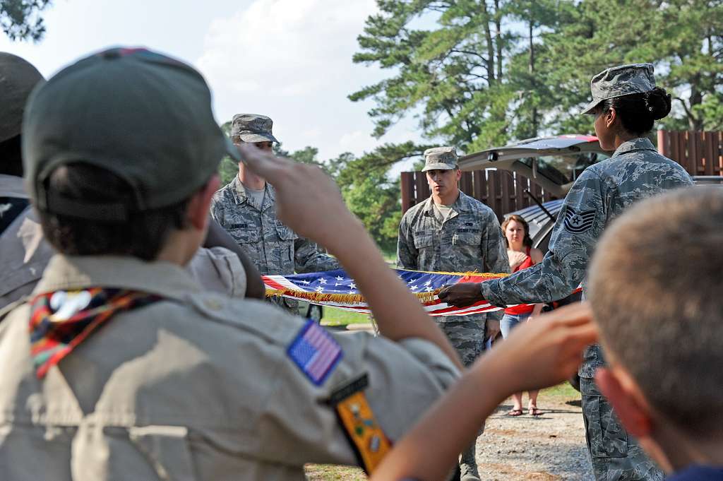 New Jersey National Guard soldiers render a salute during the Task