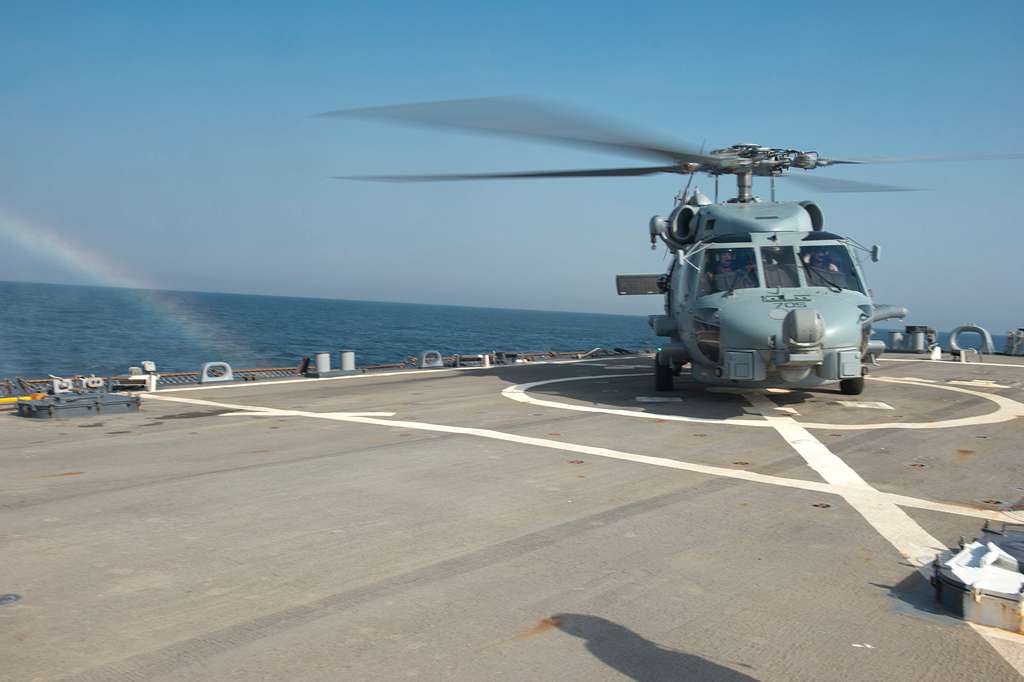 A U.S. Navy MH-60R Seahawk helicopter assigned to Helicopter - PICRYL ...