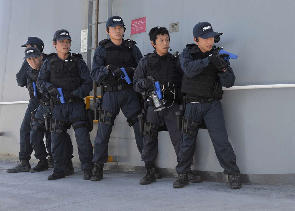 Japan Maritime Self-Defense Force sailors clear the - PICRYL