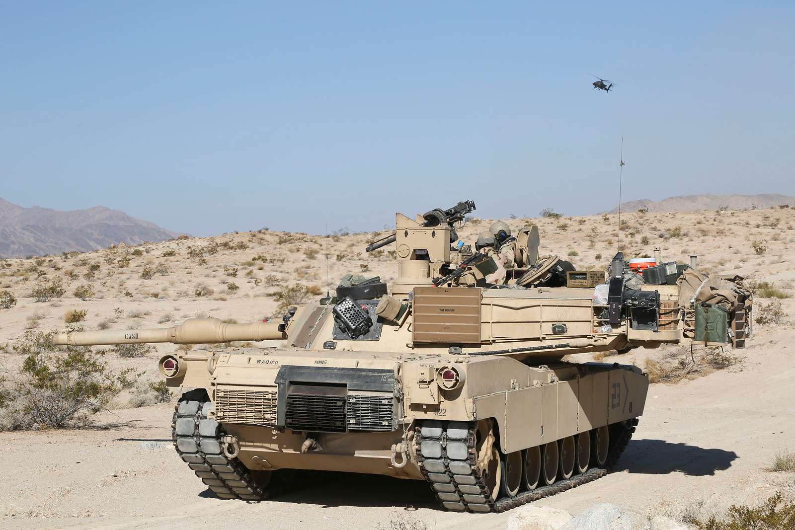 An M1 Abrams tank maneuvers through the National Training - U.S ...