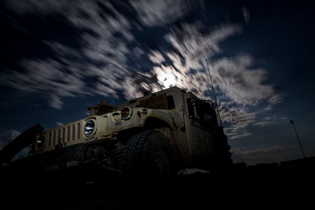 https://cdn2.picryl.com/photo/2014/08/11/a-humvee-sits-at-night-during-decisive-action-rotation-bb8f6f-1024.jpg