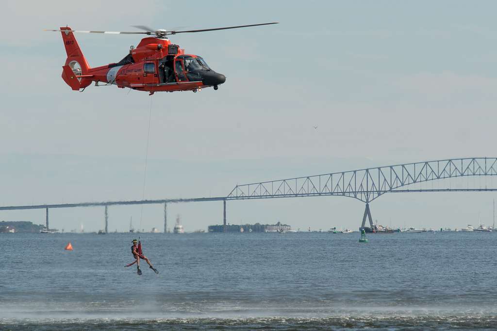 A Coast Guard Rescue Swimmer Is Hoisted From An Mh 60 Nara And Dvids