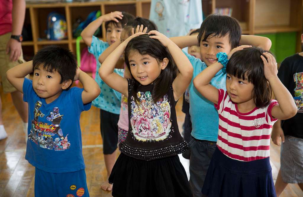 Preschool students and Marines dance and sing to “Head, - NARA & DVIDS  Public Domain Archive Public Domain Search