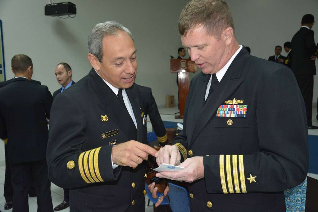 A Peruvian Navy captain, left, and U.S. Navy Capt. - NARA & DVIDS ...