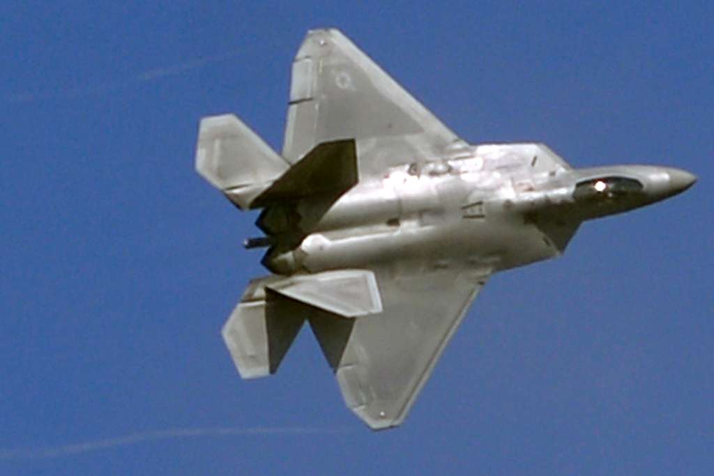 An F-22 flies over the U.S. Air Force Academy's terrazzo - NARA & DVIDS ...