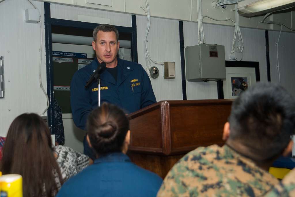 Cmdr. Gary Harrington, commanding officer of the amphibious - NARA ...