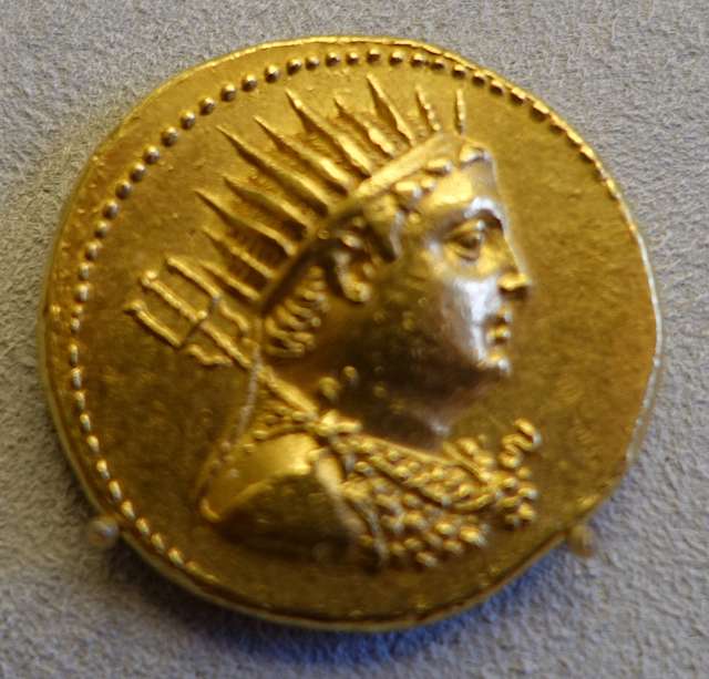 Ptolemy IV Philopator with radiant crown, gold octadrachm. Metropolitan