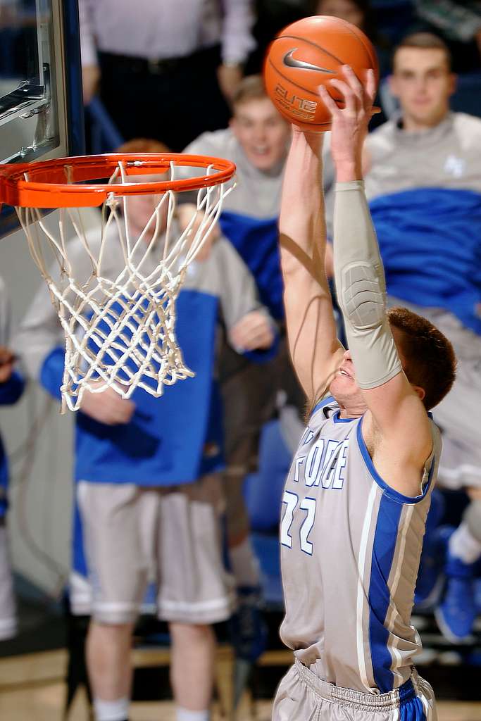 Senior guard Max Yon dunks for 2 points against conference