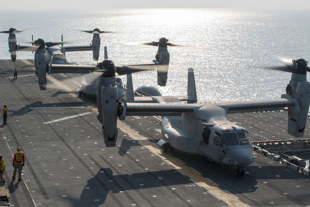 Three MV-22B Ospreys prepare for lift off during flight - PICRYL Public ...