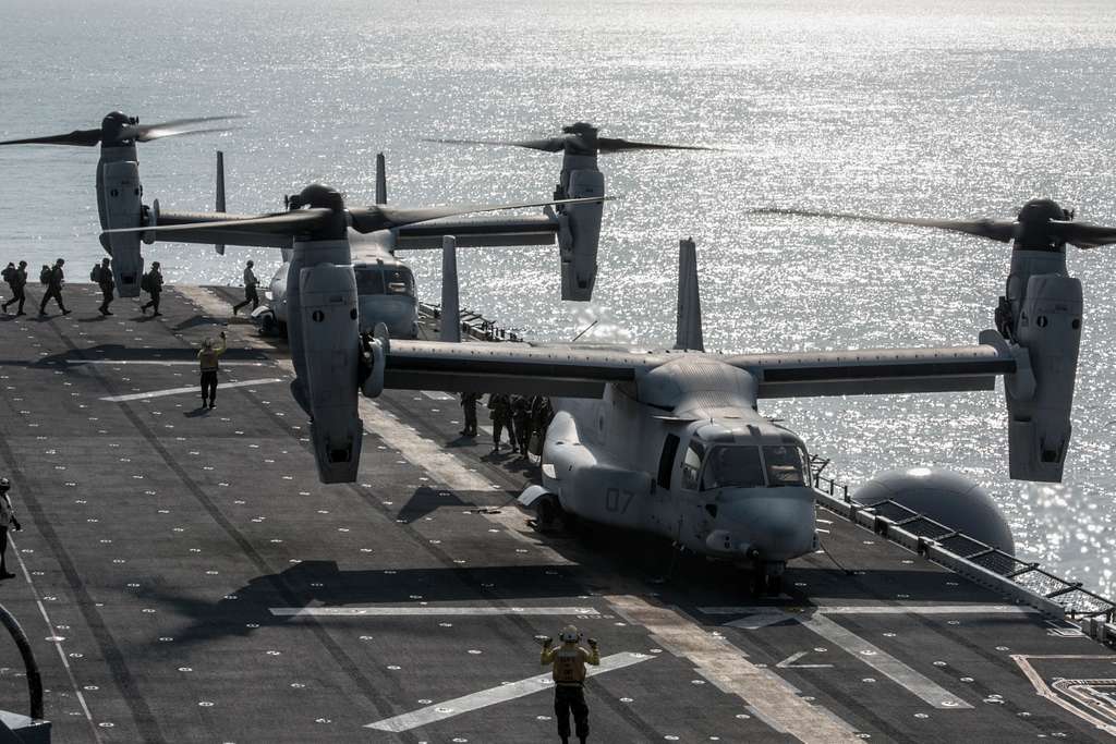 Two MV-22B Ospreys prepare for lift off during flight - PICRYL - Public ...