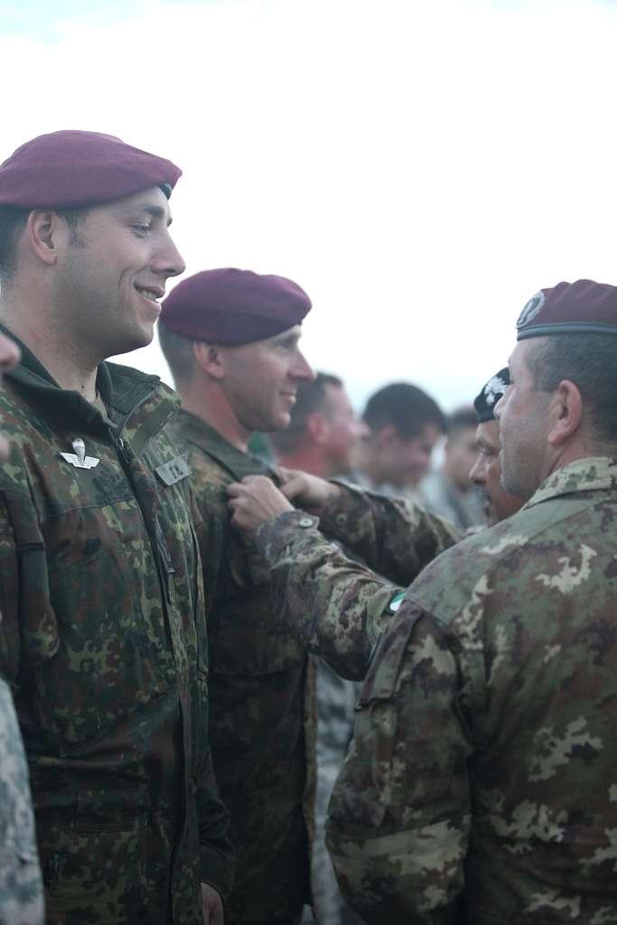 A German paratrooper receives Italian jump wings after - NARA & DVIDS ...