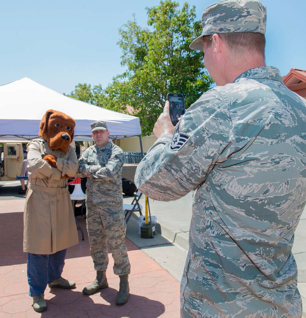 McGruff the Crime Dog takes time to pose with patrons - NARA & DVIDS ...