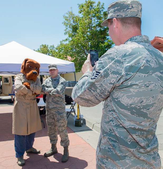 McGruff the Crime Dog takes time to pose with patrons - NARA & DVIDS ...