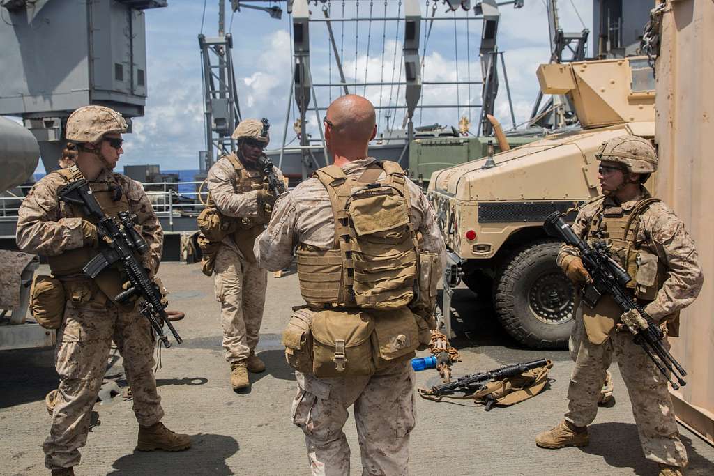 U.S. Marine Sgt. Chad Skaggs, center, instructs his - PICRYL - Public ...