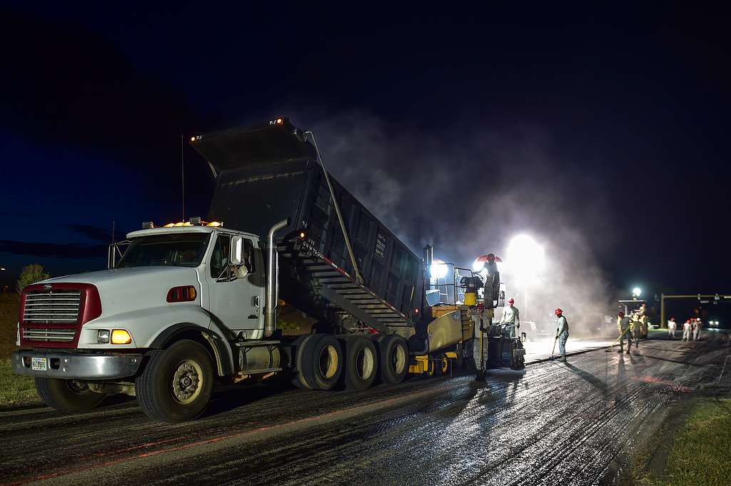 Airmen from the 823rd RED HORSE Squadron lay asphalt - NARA & DVIDS ...