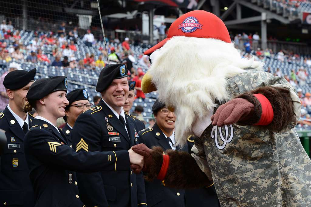 Screech, the Washington Nationals' mascot, offers Chief Navy Career  Counselor Michael Robinson his cover. - PICRYL - Public Domain Media Search  Engine Public Domain Search