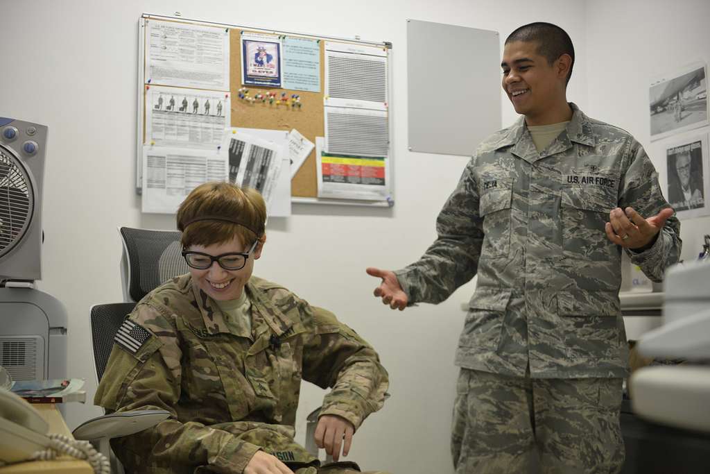 U.S. Army Sgt. Kayla Benson demonstrates the fit of - PICRYL Public ...