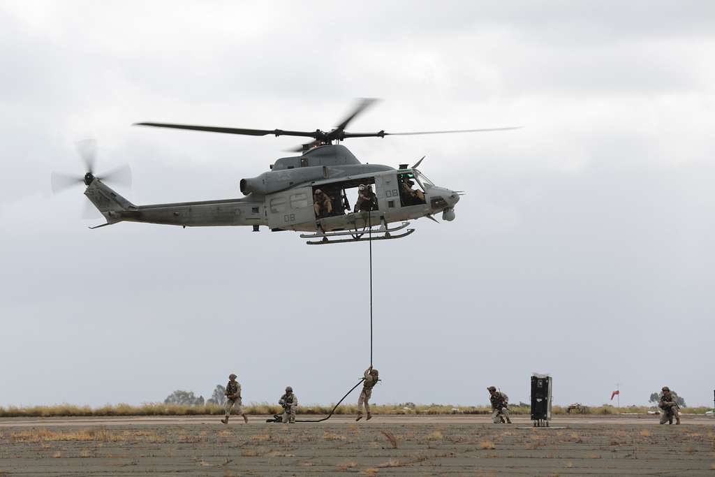 Helicopter-borne Marines fast rope from a UH-1Y Huey - NARA & DVIDS ...