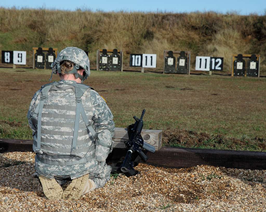 A Soldier awaits commands to begin to zero her M4 rifle - PICRYL Public ...