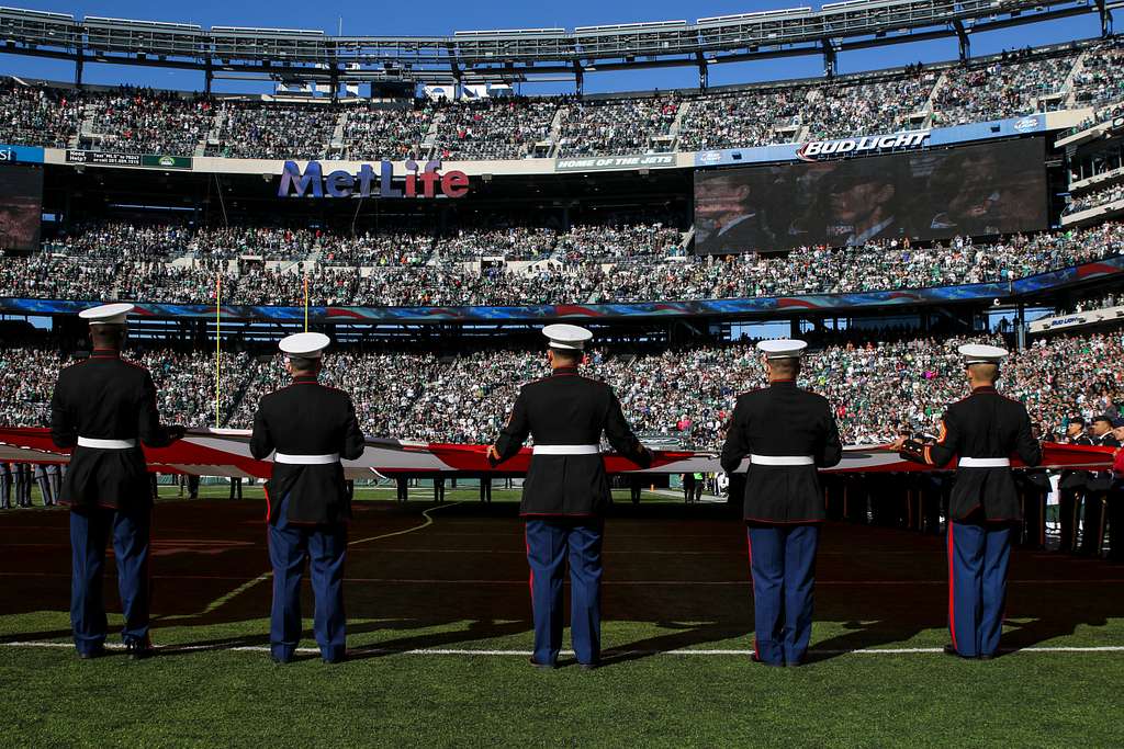 DVIDS - Images - Service Members Unfurl Flag at NY Jets First Home