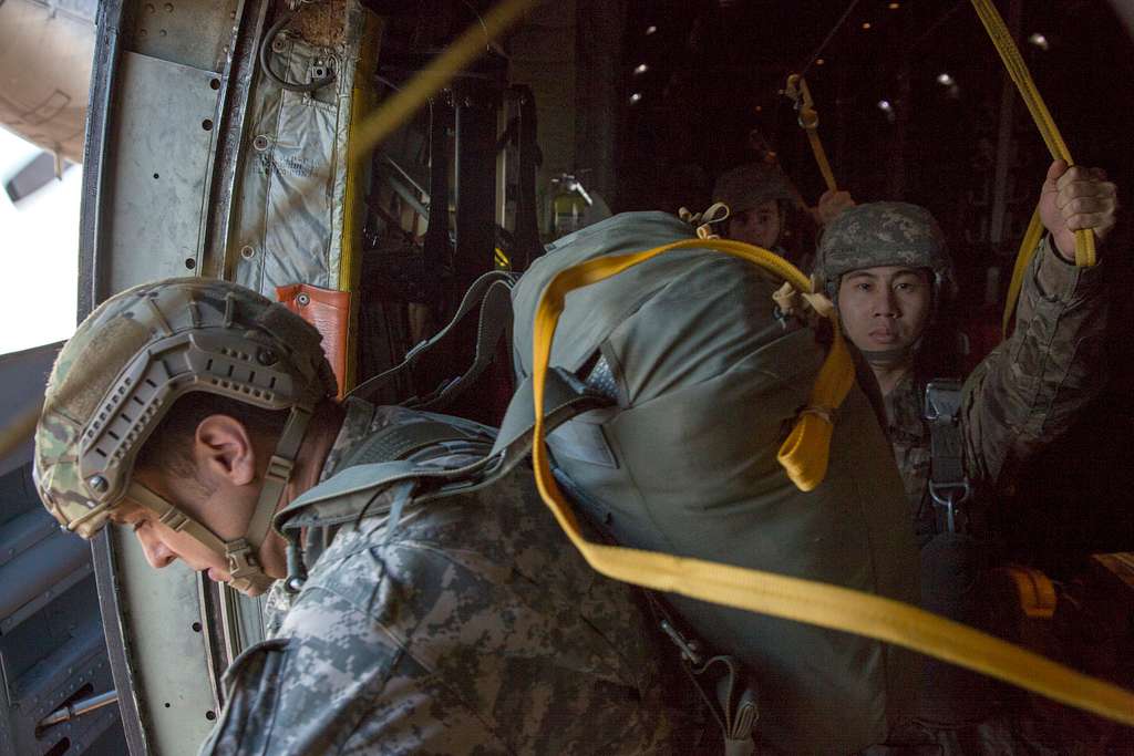 A U.S. Army paratrooper jumps out the door of a C-130 - PICRYL - Public ...