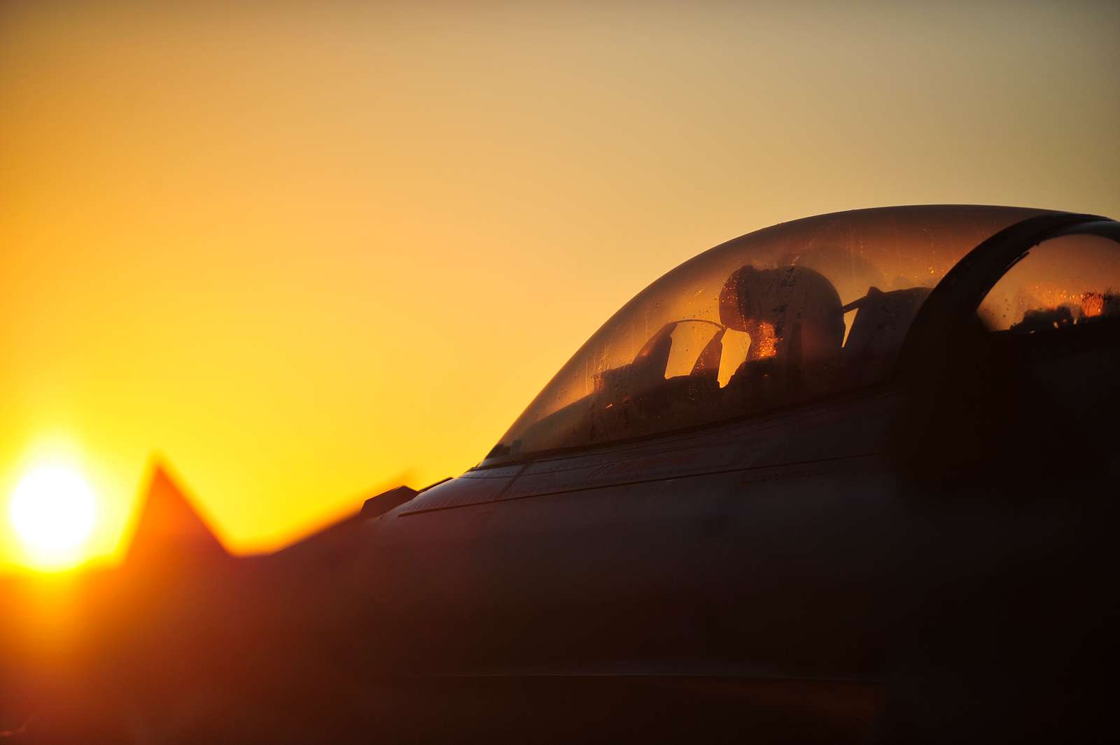 An F-16 Falcon pilot with the 77th Fighter Squadron, - NARA & DVIDS ...