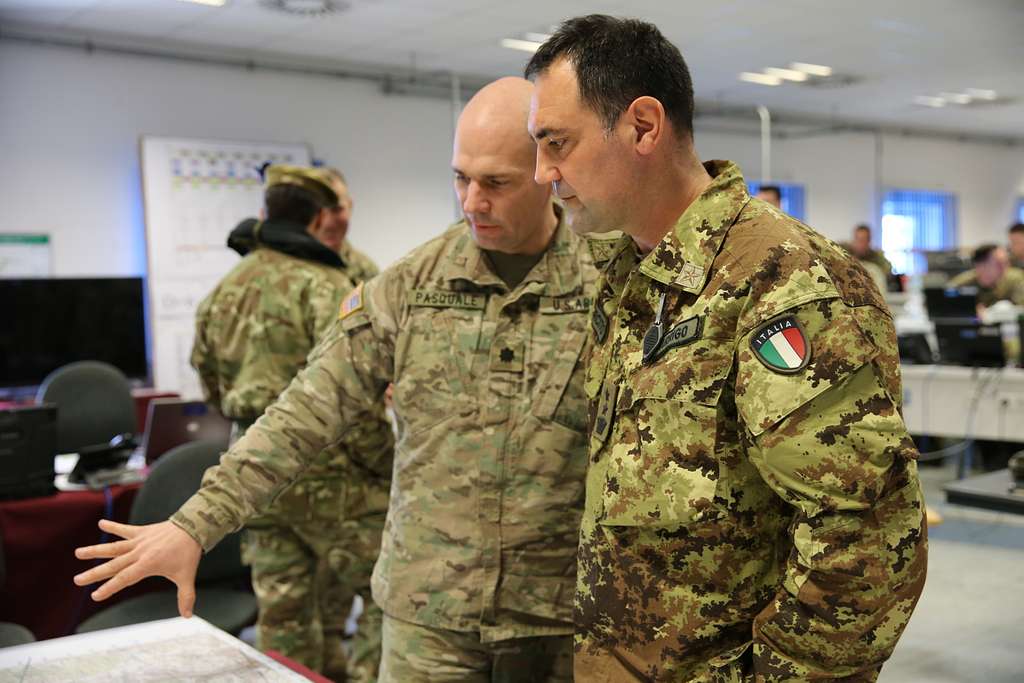 An Italian soldier of the Garibaldi Brigade, right, - NARA & DVIDS ...