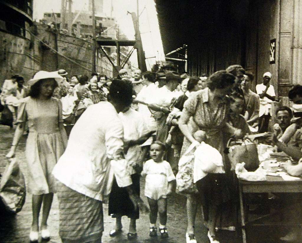 Singapore as women and children at port prepare for evacuation before ...