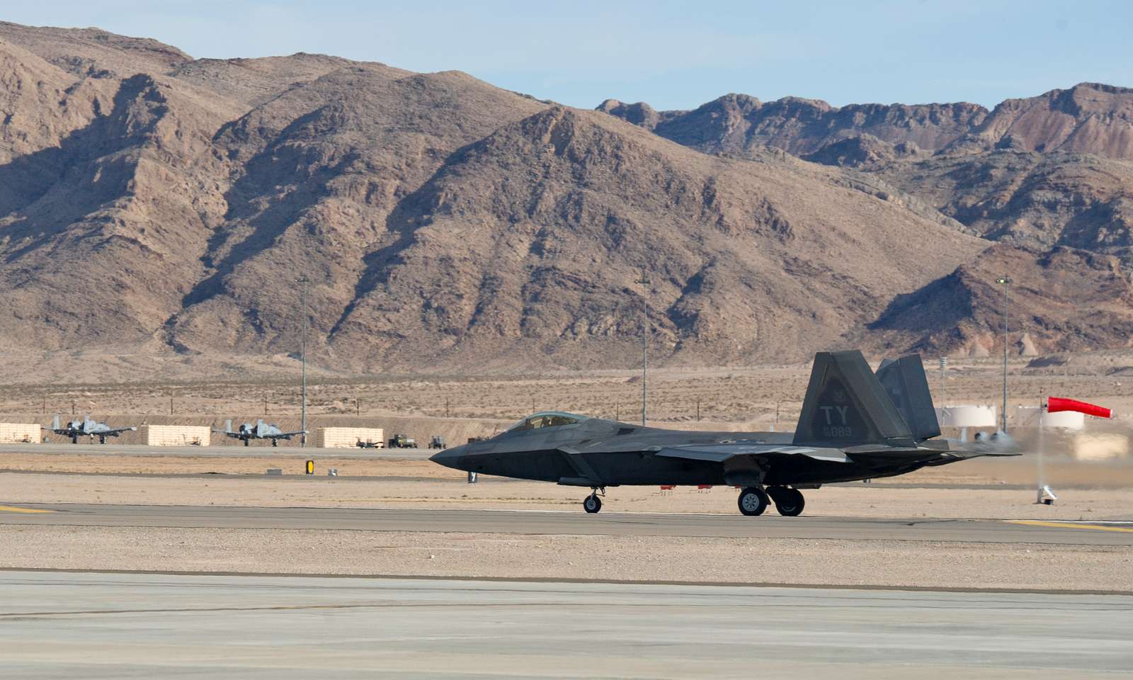 An F-22 Raptor assigned to the 95th Fighter Squadron, - NARA & DVIDS ...