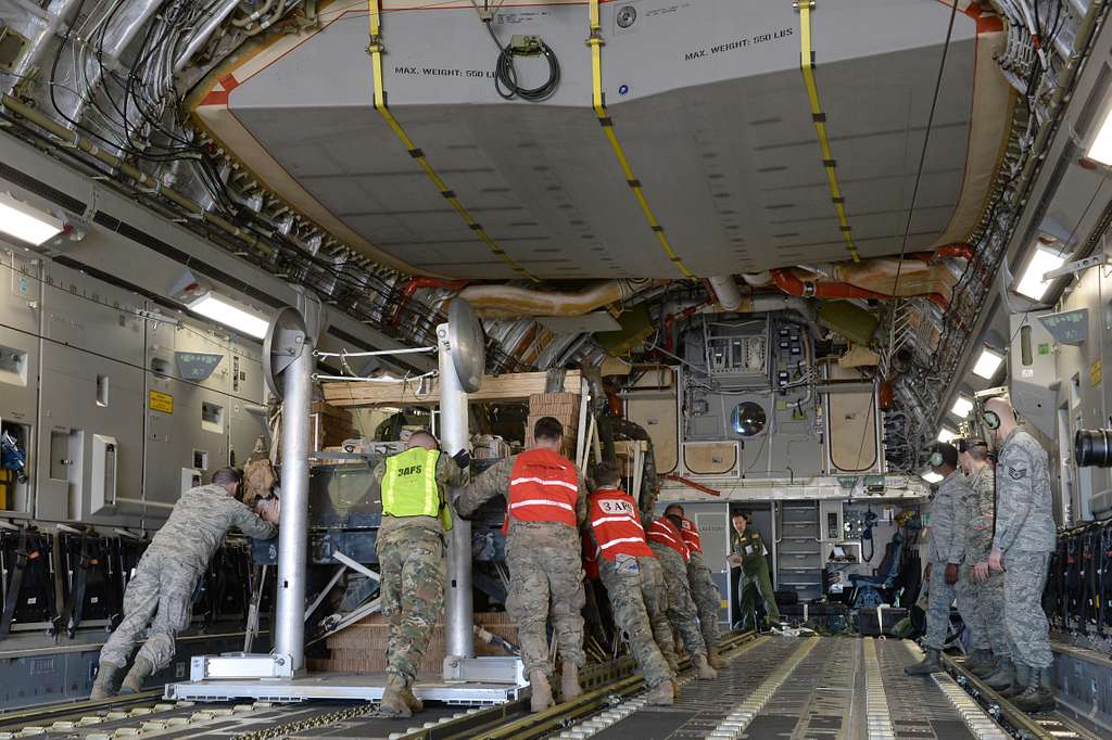 Aerial Port Squadron members load a High Mobility Vehicles - PICRYL ...