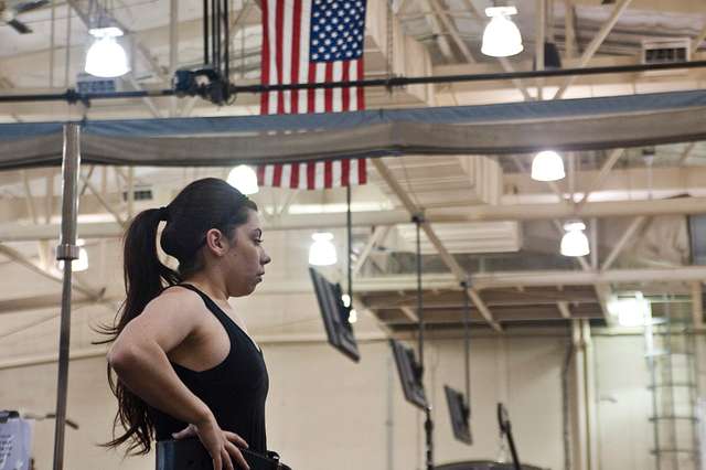 Alyssa, a Senior Airman with the 22nd Intelligence Squadron, prepares to  complete a set number of resistance-band deadlifts during her training at  the Gaffney Fitness Center Feb. 6, 2016 at Fort George