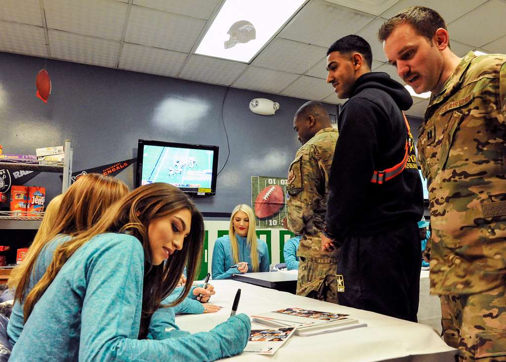 DVIDS - News - Cheer for troops: Miami Dolphins cheerleaders visit with,  entertain troops at Bagram