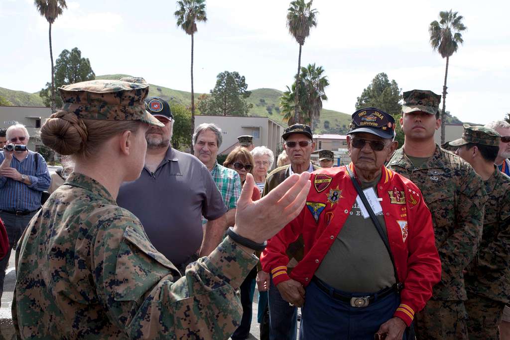 A U.S. Navy Corpsman from 1st Medical Battalion, speaks - NARA & DVIDS ...